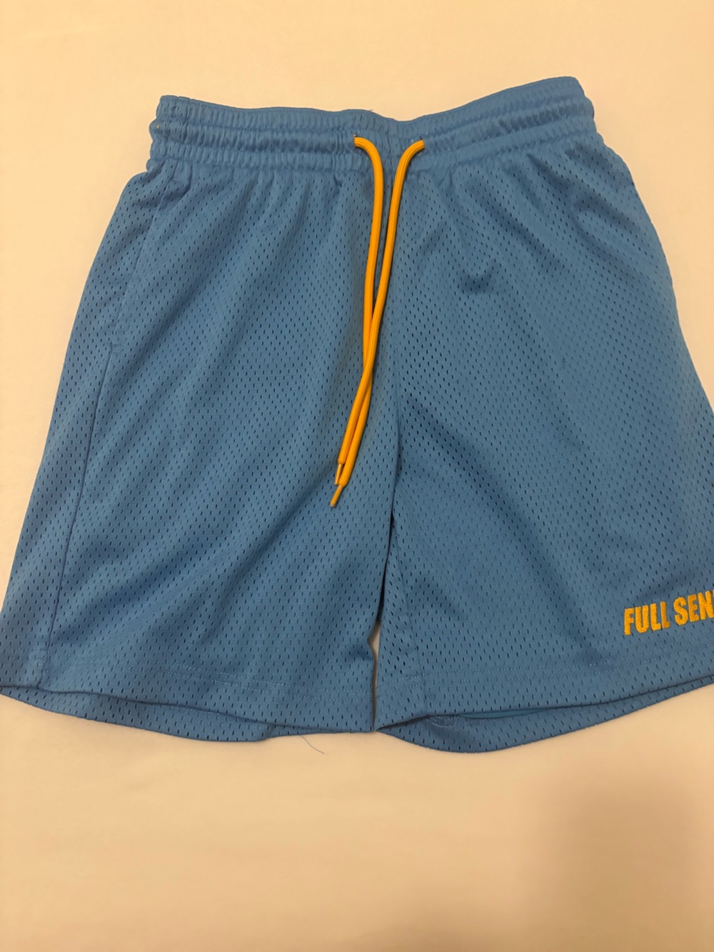 Light Blue Athletic Mesh Shorts with Yellow Drawcord